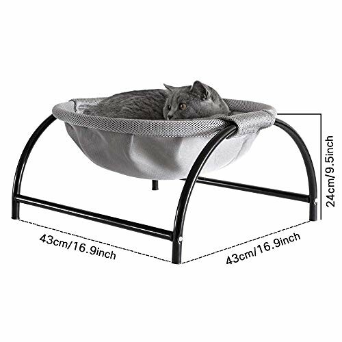 Cat lying in a raised hammock bed with dimensions shown.